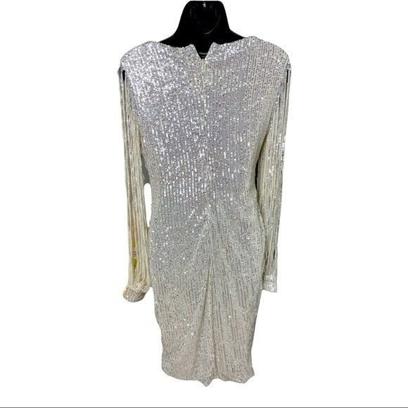 Stunning gold sequin mini dress with shredded long sleeves NWOT